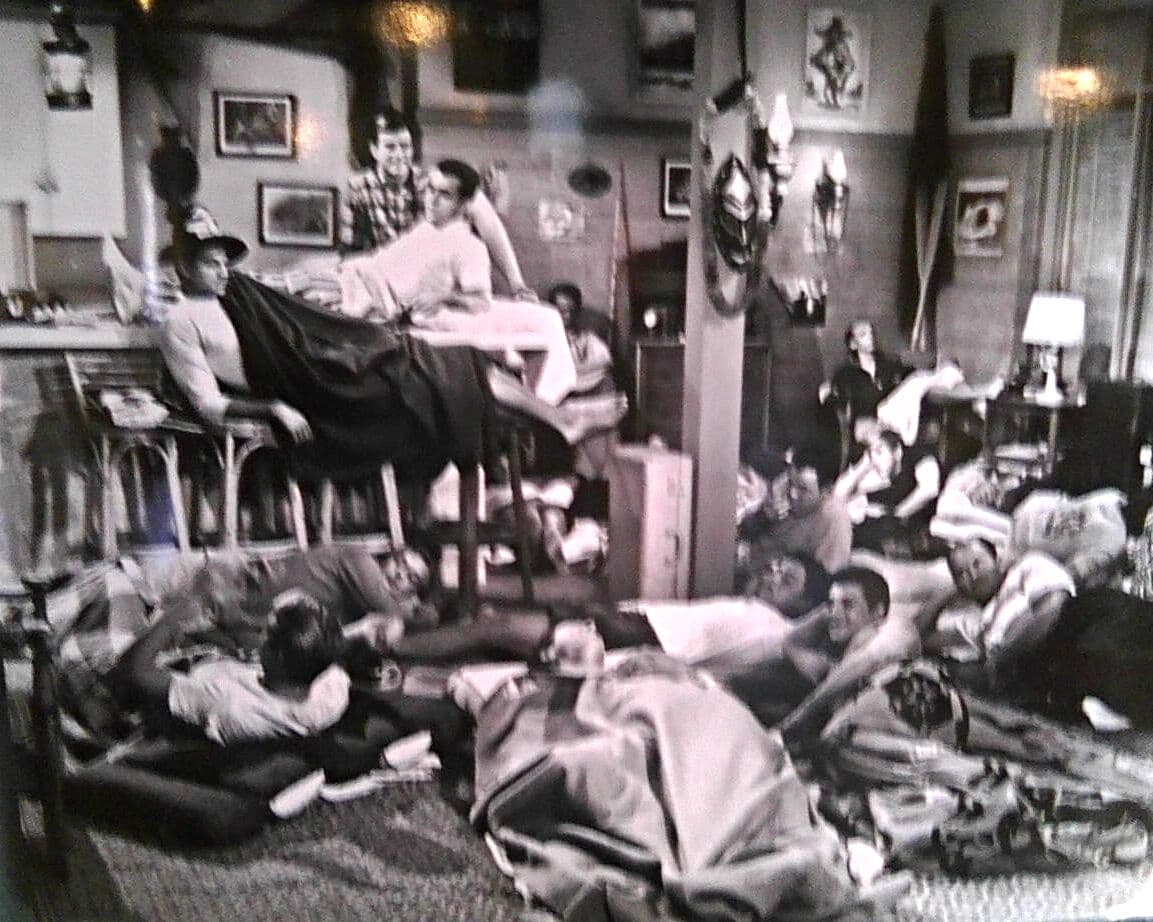 Club members gathered in a 1960s clubhouse