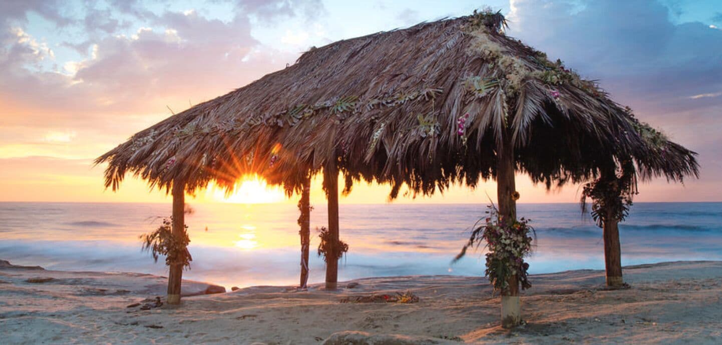 The Windansea shack silhouetted against a sunset